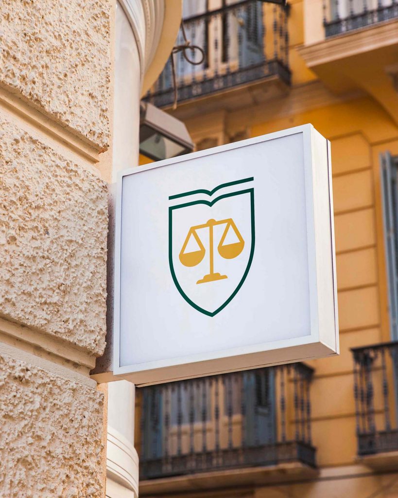 Enseigne urbaine affichant le logo de CIB Avocats.