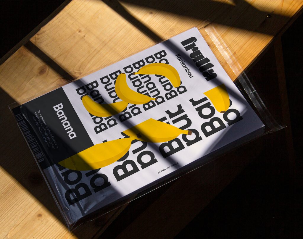 Magazine posé sur une table avec en couverture le logo Frutta.